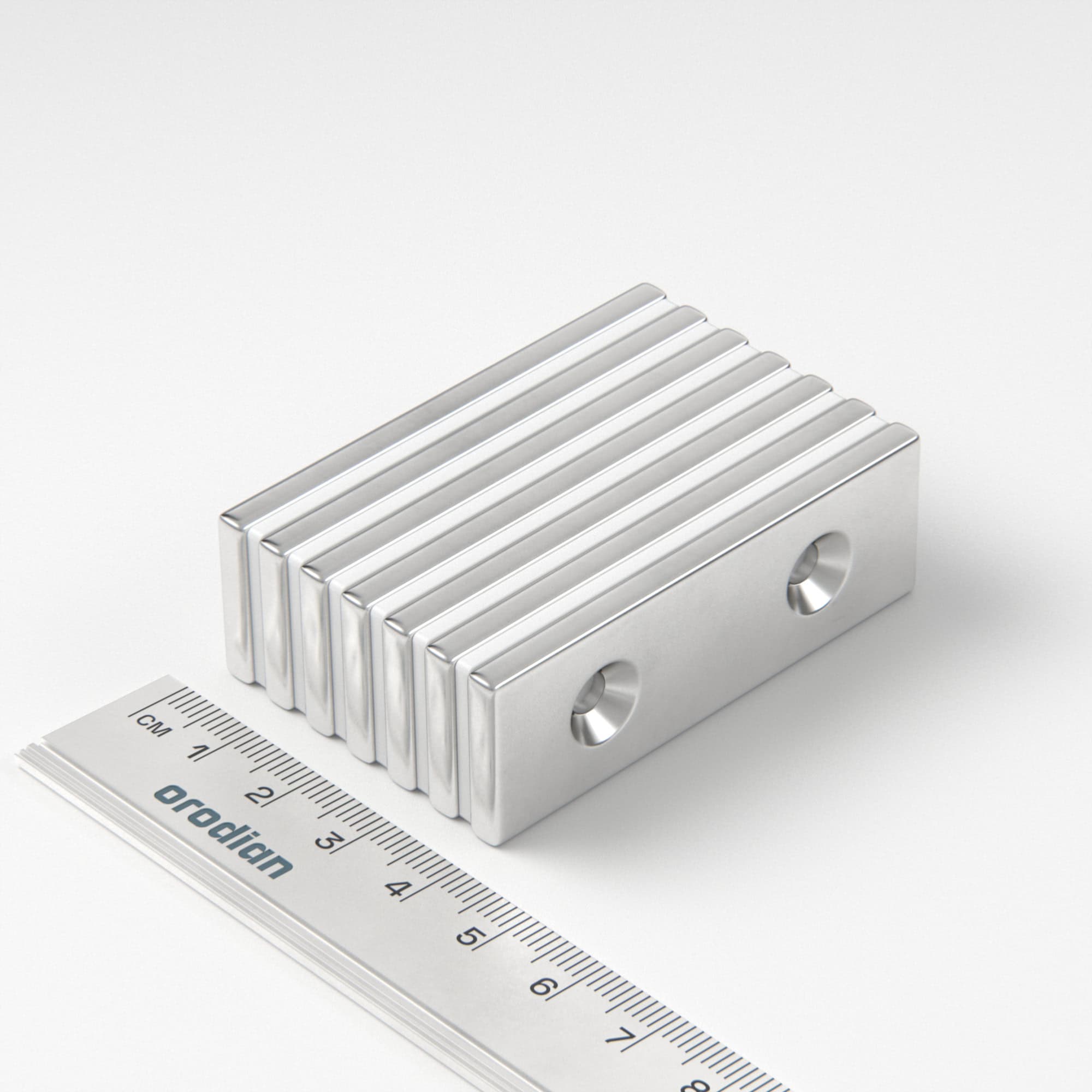 Neodýmový magnet kváder 60×20×4 mm s 2 dierami M4 (severný pól na strane s priehlbinami) - N38