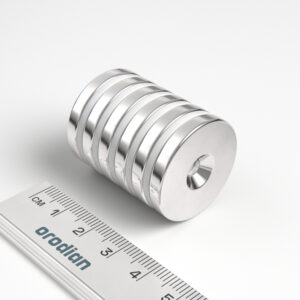 Neodýmový magnet valec 27×4 mm s dierou M4 (južný pól na strane s priehlbinou) - N38