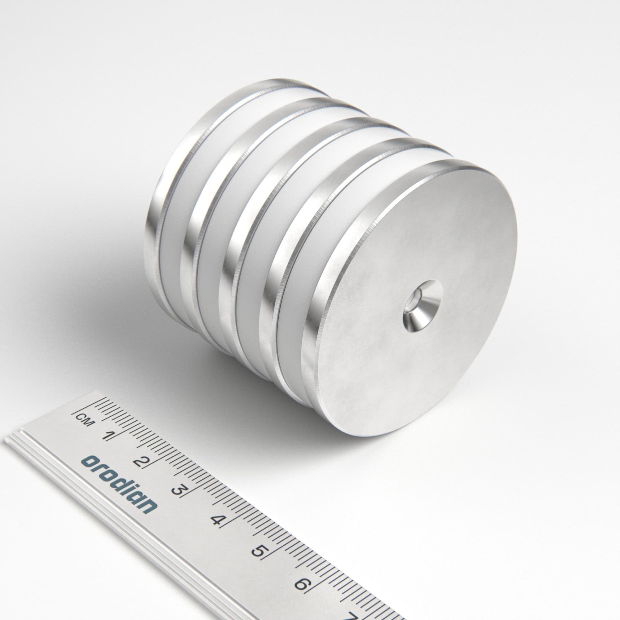 Neodýmový magnet valec 50×4 mm s dierou M4 (severný pól na strane s priehlbinou) - N35